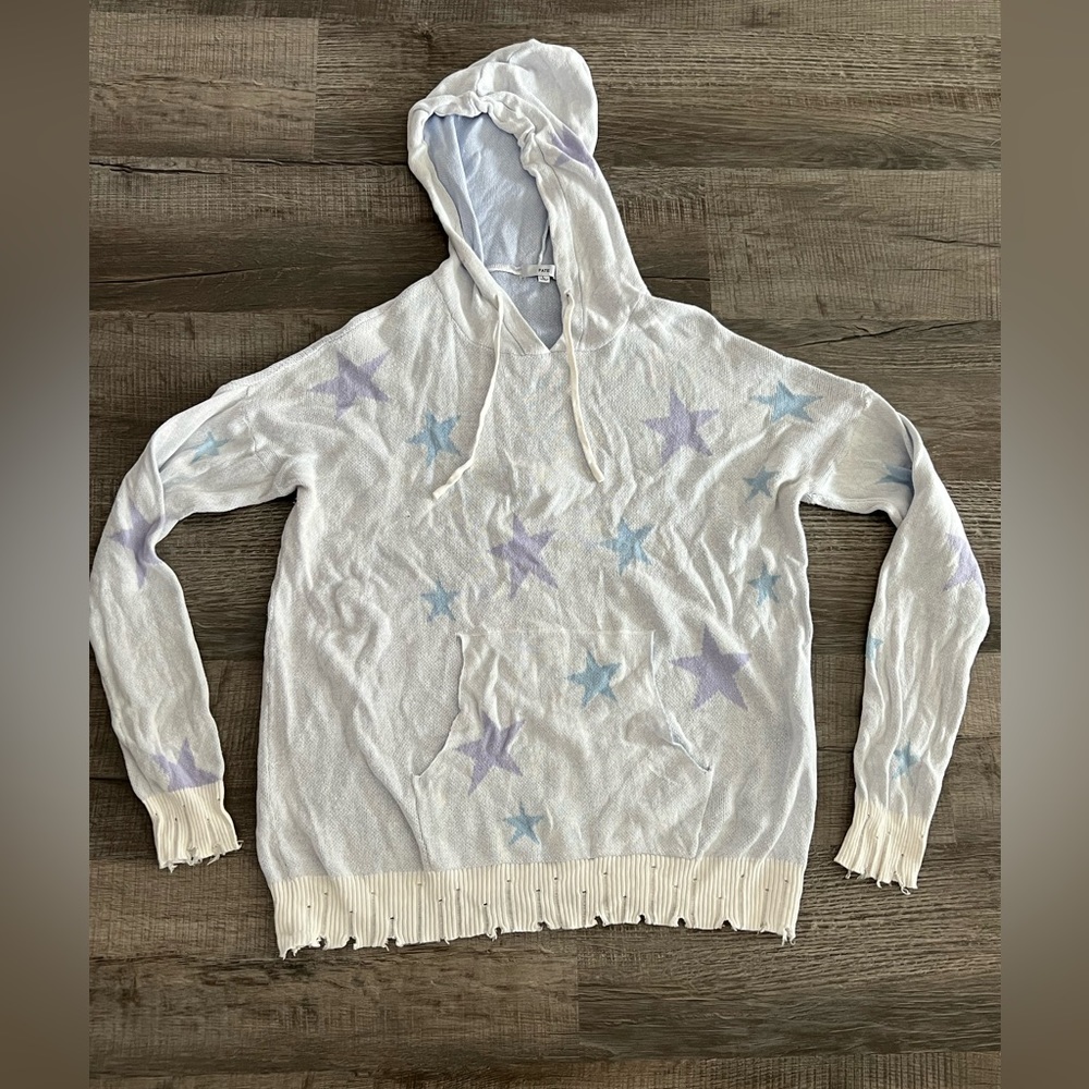 Light Long Sleeve Hoodie. Light blue with blue and purple stars. Size L.